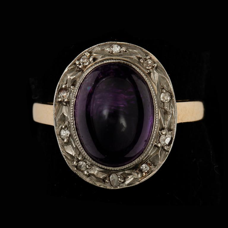 RING, guld 18K, cabochonslipad ametist, Sverige 1950. Vikt ca 3 gram.