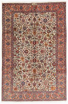 A carpet, semi-antique Tabriz, signed Aamal-Hassa, ca 284 x 188 cm cm.