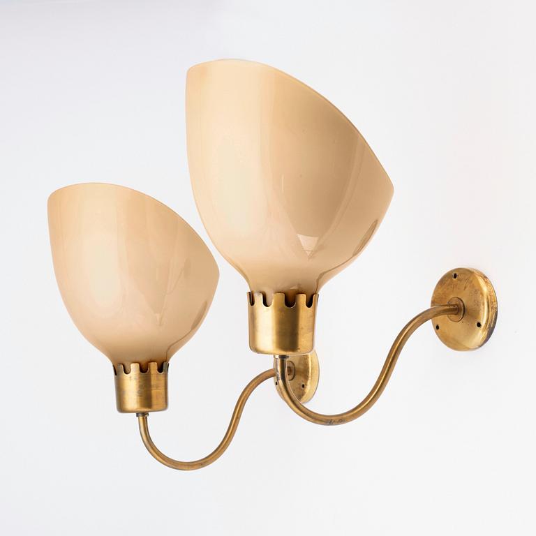 Harald Notini, a pair of large wall sconces, model '8566/A', Arvid Böhlmarks Lampfabrik, Sweden, 1940s.