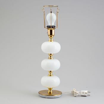 A glass and metal table light from Stilarmatur, Tranås, 1960's/70's.