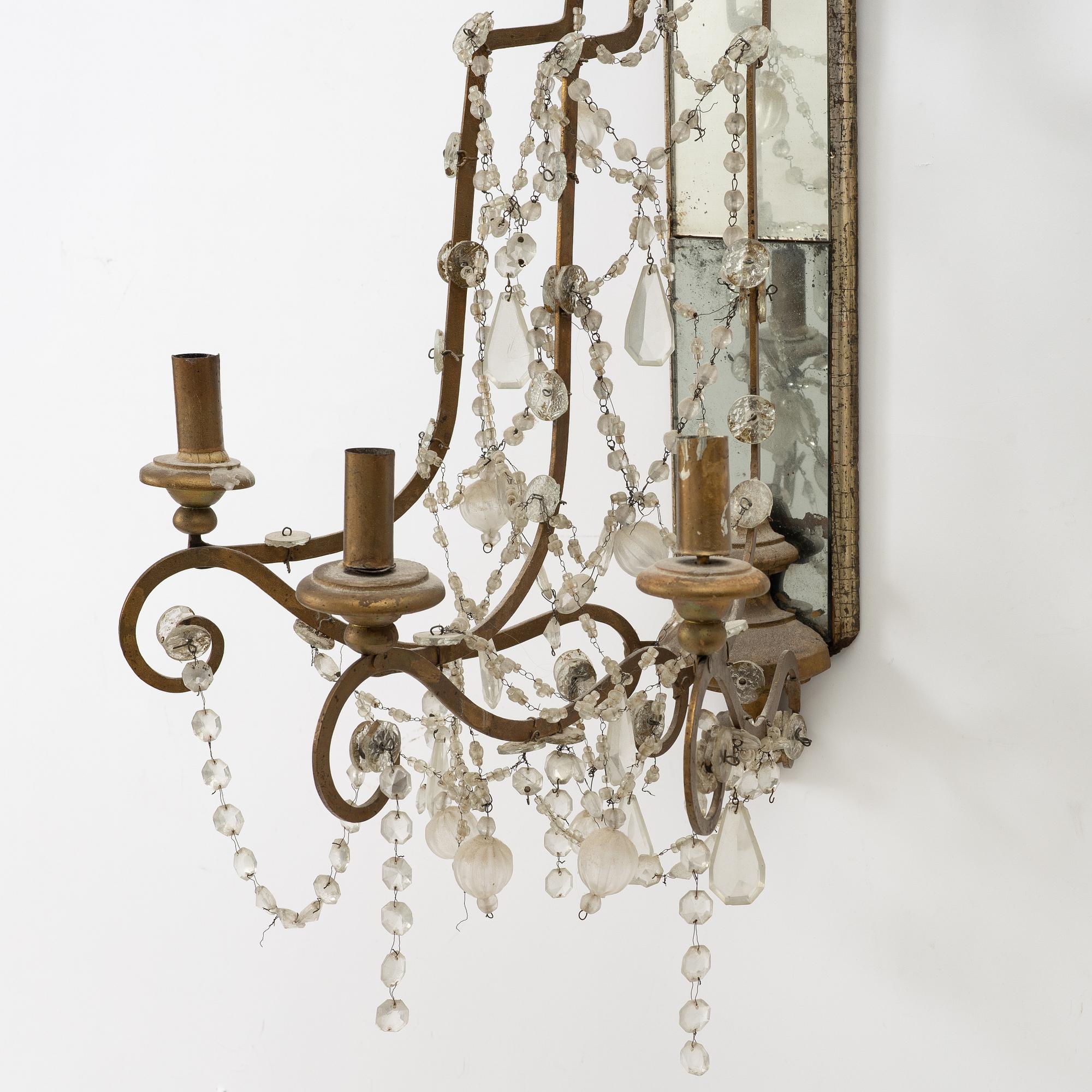A pair of mirror wall sconces, second half of the 20th Century.
