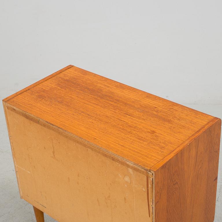 A mid 20th century teak bureau.