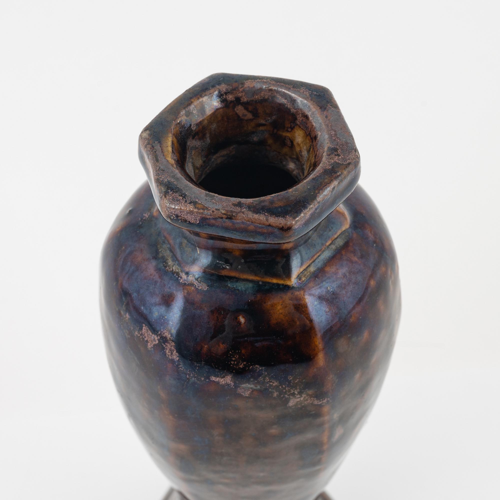 A brown glazed vas, Ming dynasty (1368-1644).