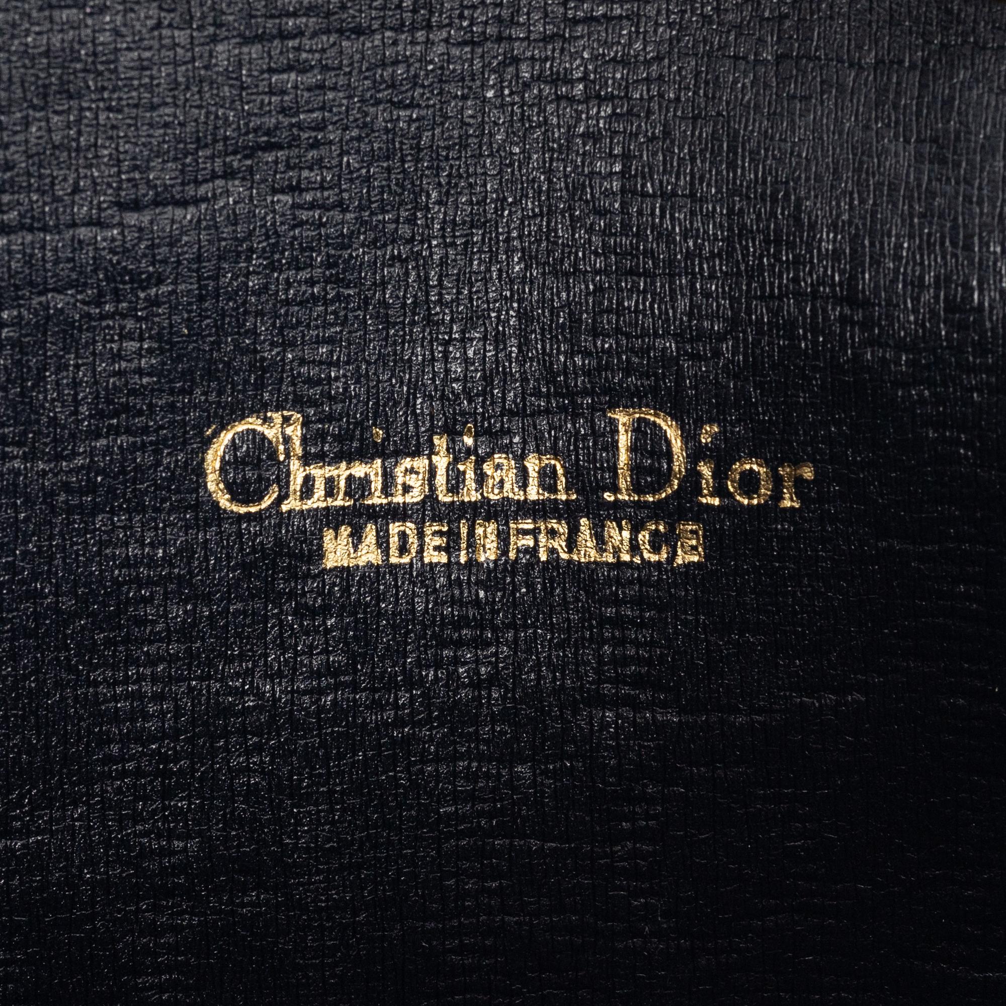Christian Dior, bag and scarf.