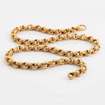 An 18K gold Tännler necklace.