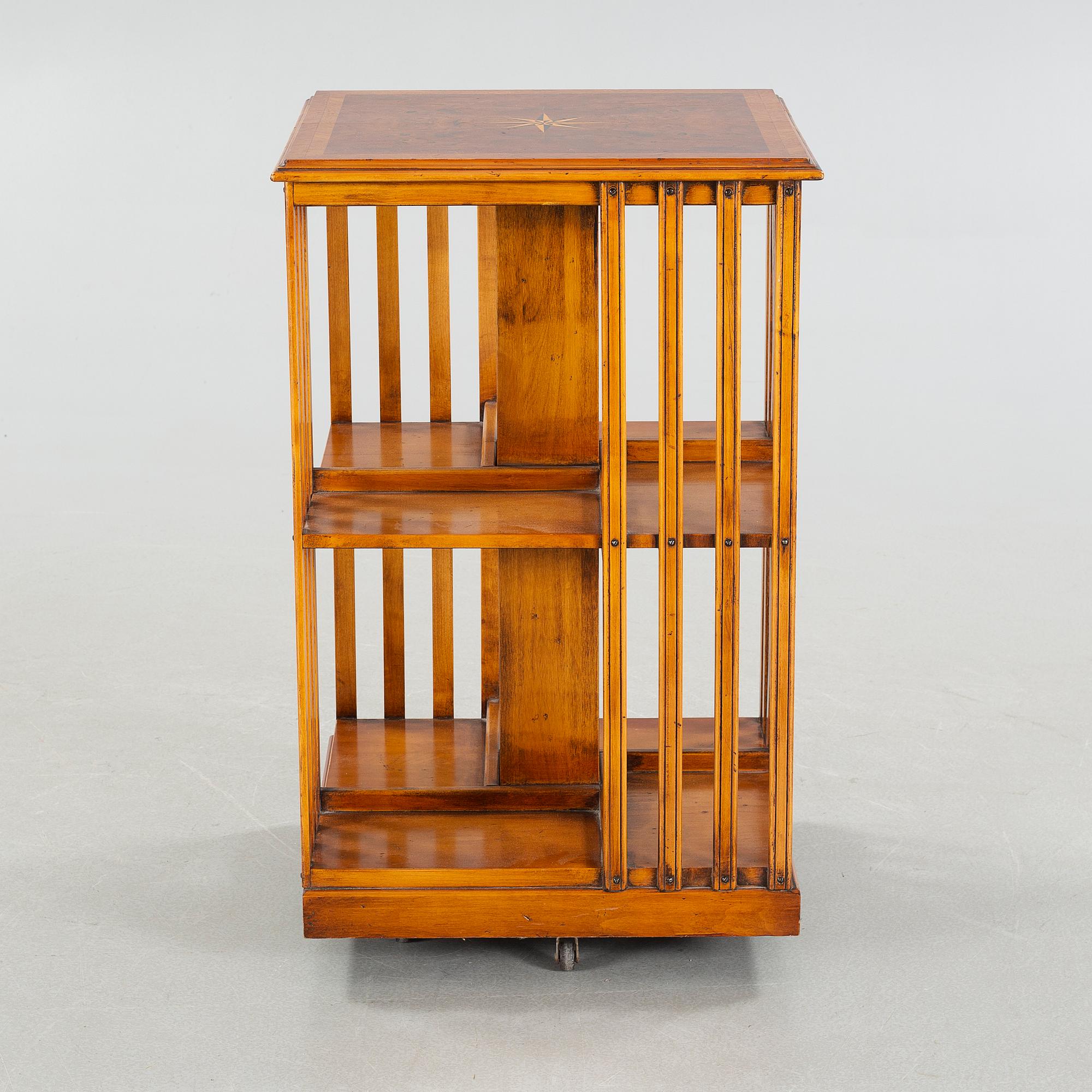 A circa mid 20th century turning book case.