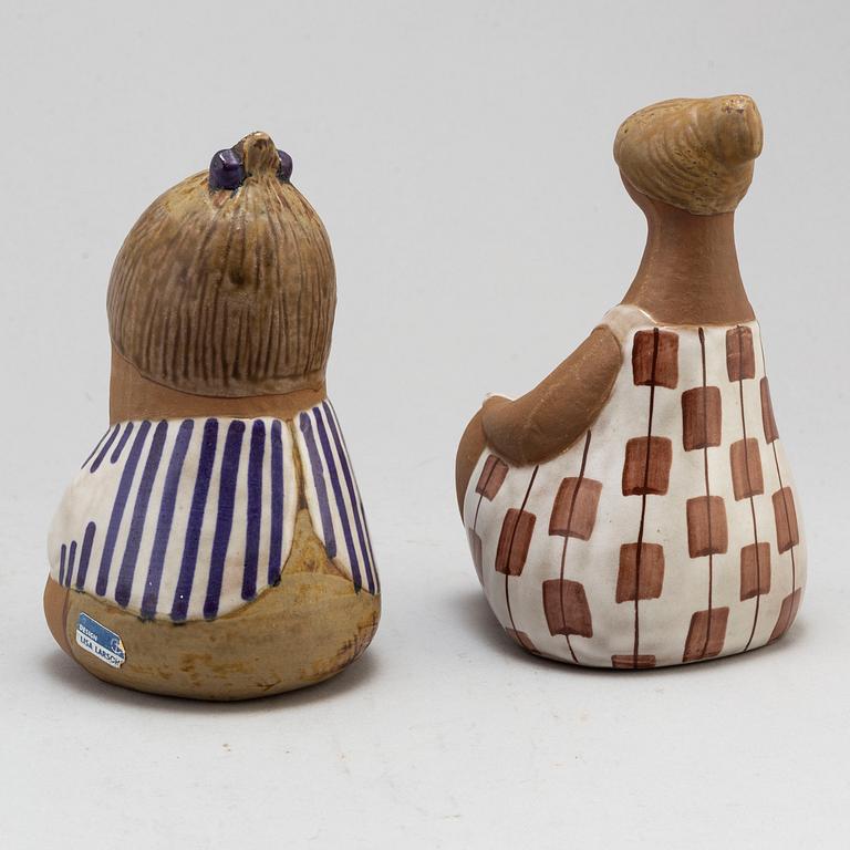 LISA LARSON, two signed stoneware figures.