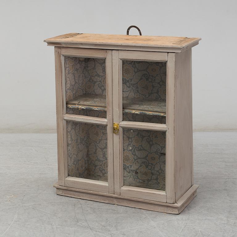a wall-cabinet from the 19th century.
