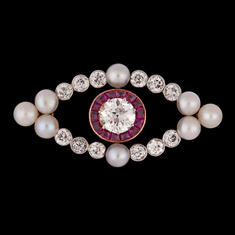 An old cut diamond and ruby brooch, c. 1915.