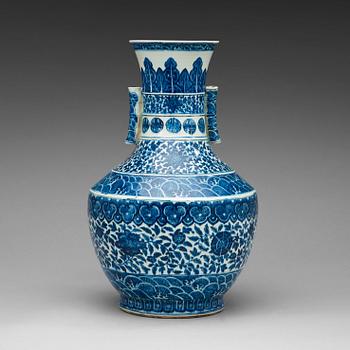 365. A blue and white vase, late Qing with Qianlong mark.