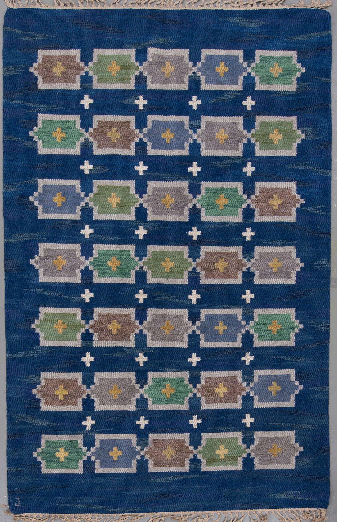 A CARPET, "Stjärnsund", flat weave, signed J (Judith Johansson), around 258 x 167 cm.