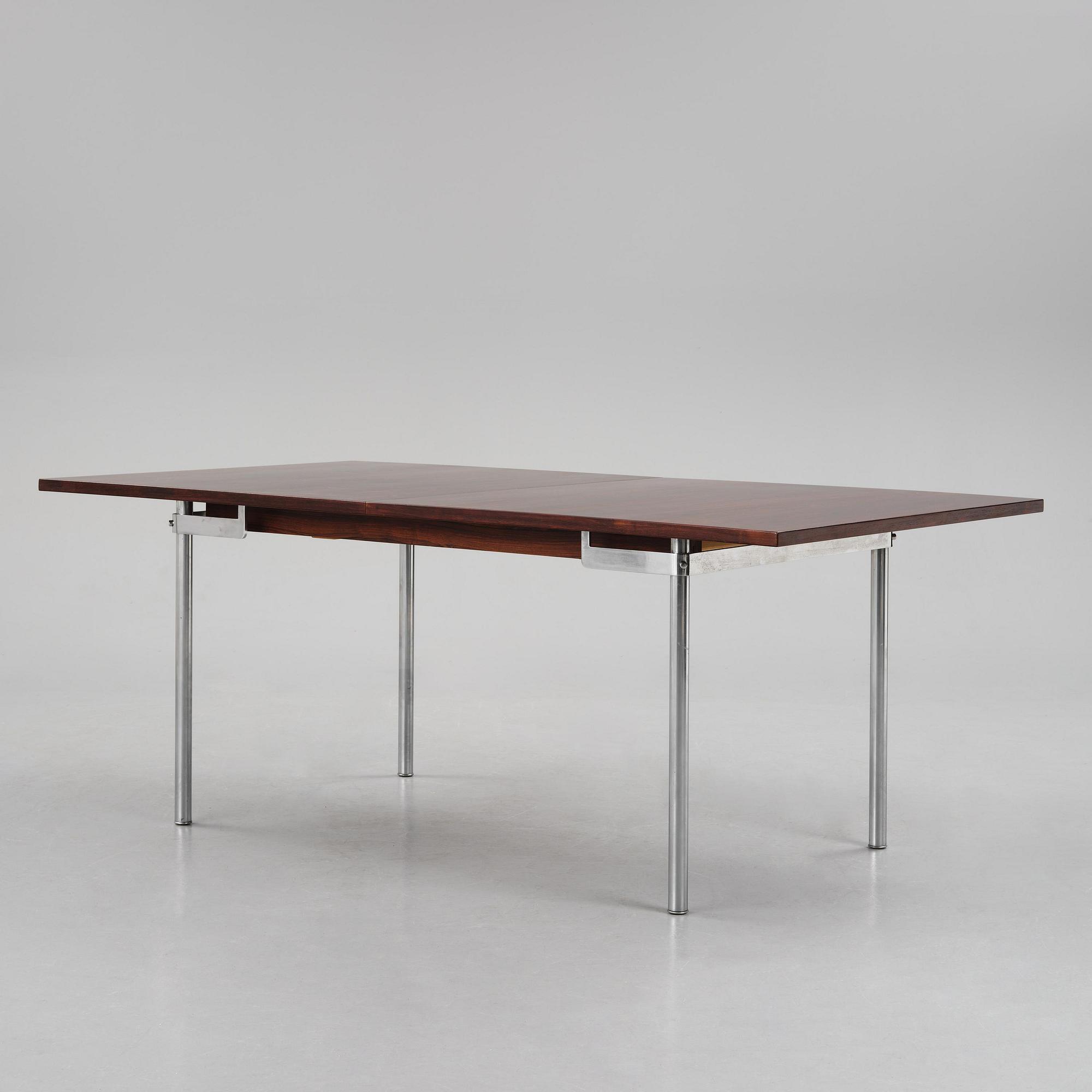 Hans J. Wegner, a rosewood "AT-322" table, Andreas Tuck, Denmark, 1960s.
