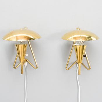 A pair of mid-20th-century wall lights / table lamps, model EV 57 for Itsu, Finland.