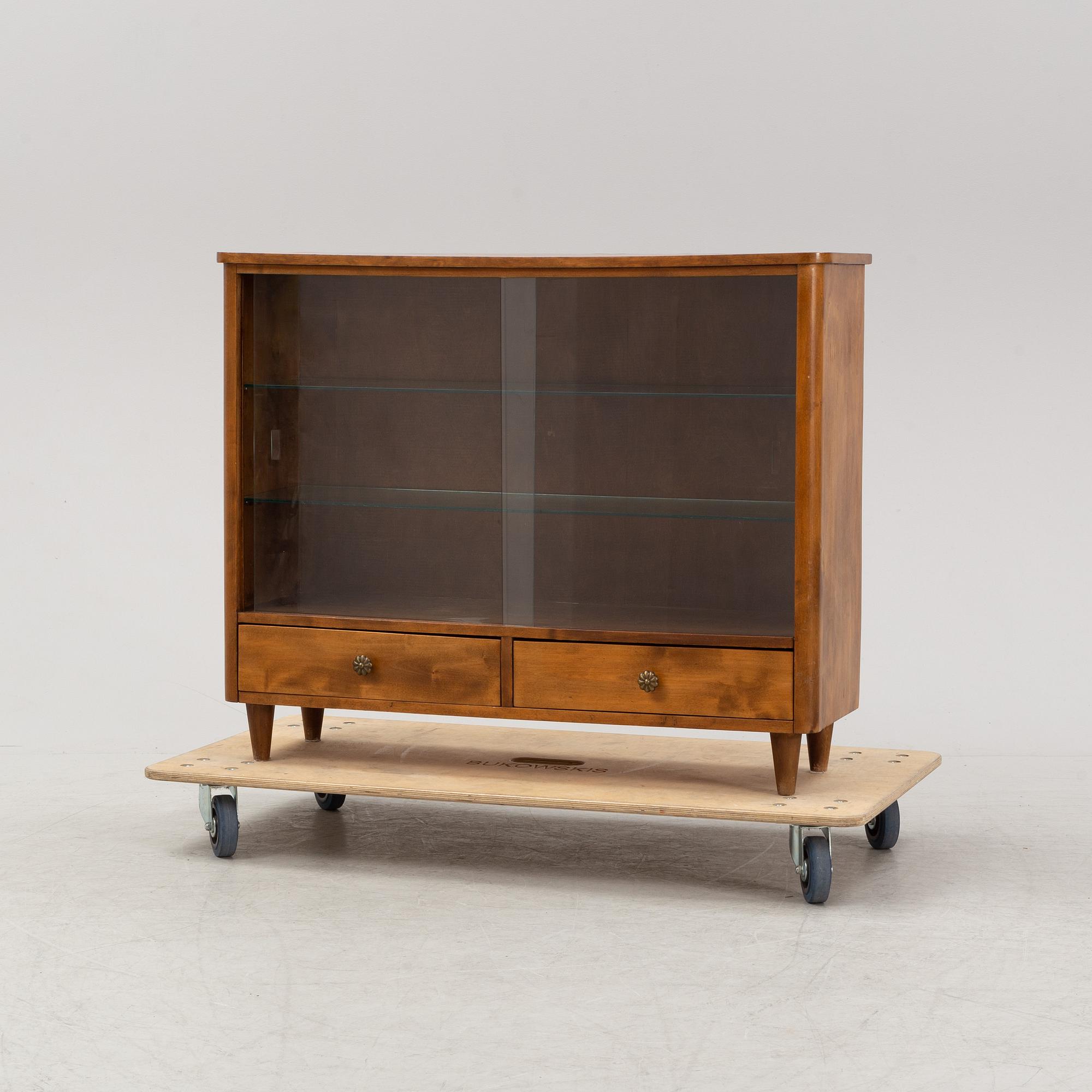 A Swedish Modern cabinet, 1940-50s.