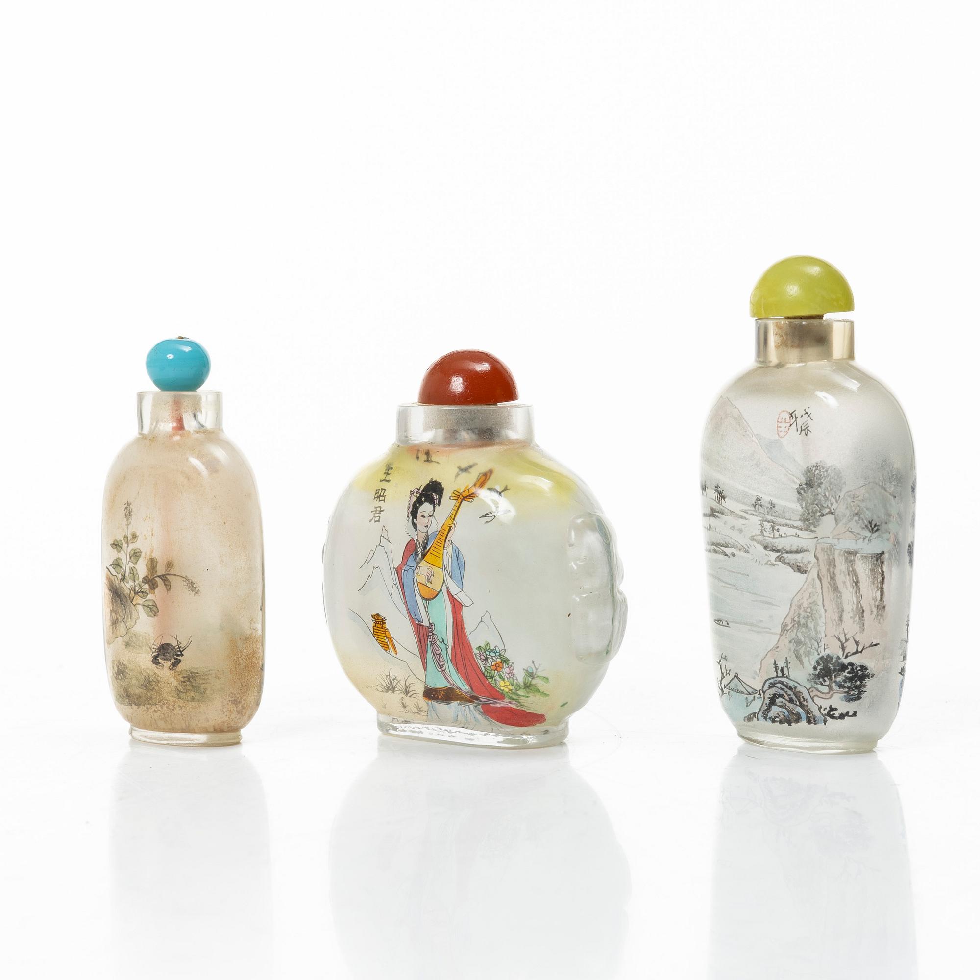 A group of three Chinese glass snuffbottles, 20th century.