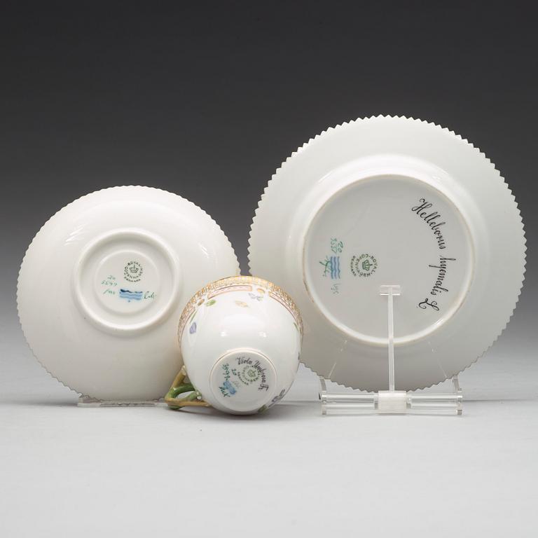 A set of eight cups with stands and six dessert dishes, Royal Copenhagen, 'Flora Danica', 20th Century.