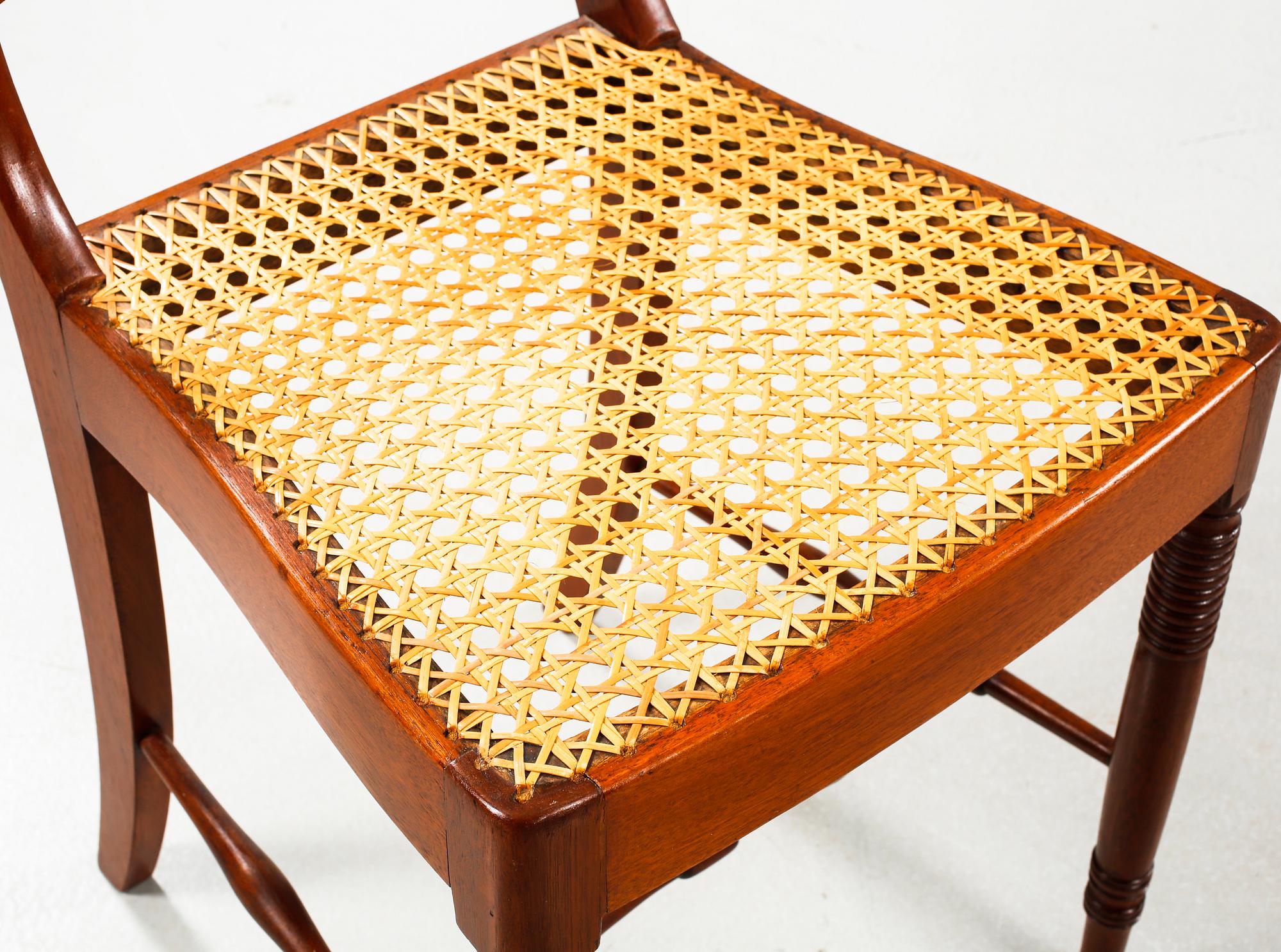 Nine chairs, made by Nils Tohrsson in Lindome (1779 - 1848) in the first half of the 19th century.