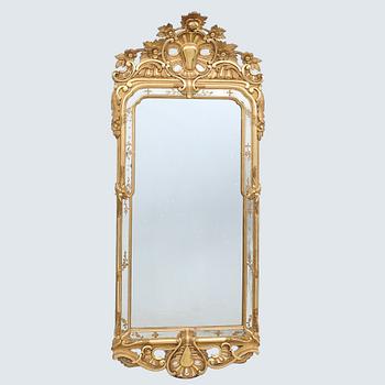 Rococo-style mirror dated 1919.