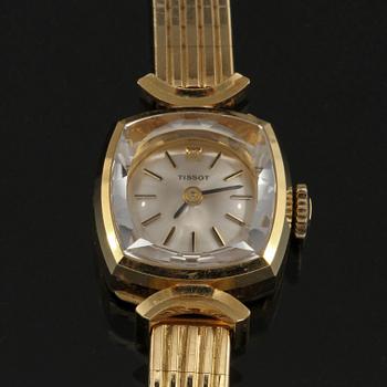 DAMARMBANDSUR, 18k guld, Tissot. Vikt 27 g.