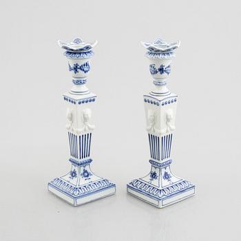 A pair of 'Blue Fluted' / 'Musselmalet' porcelain candle sticks, Royal Copenhagen, model 15, 1960's/70's.