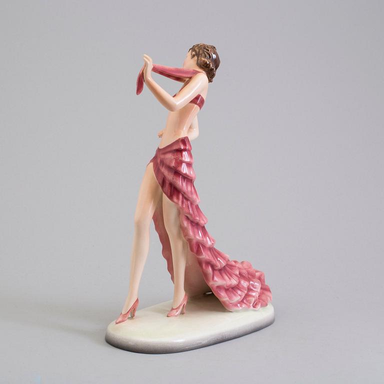 a creamware figurine by Stefan Dakon, Goldscheider, 1938.