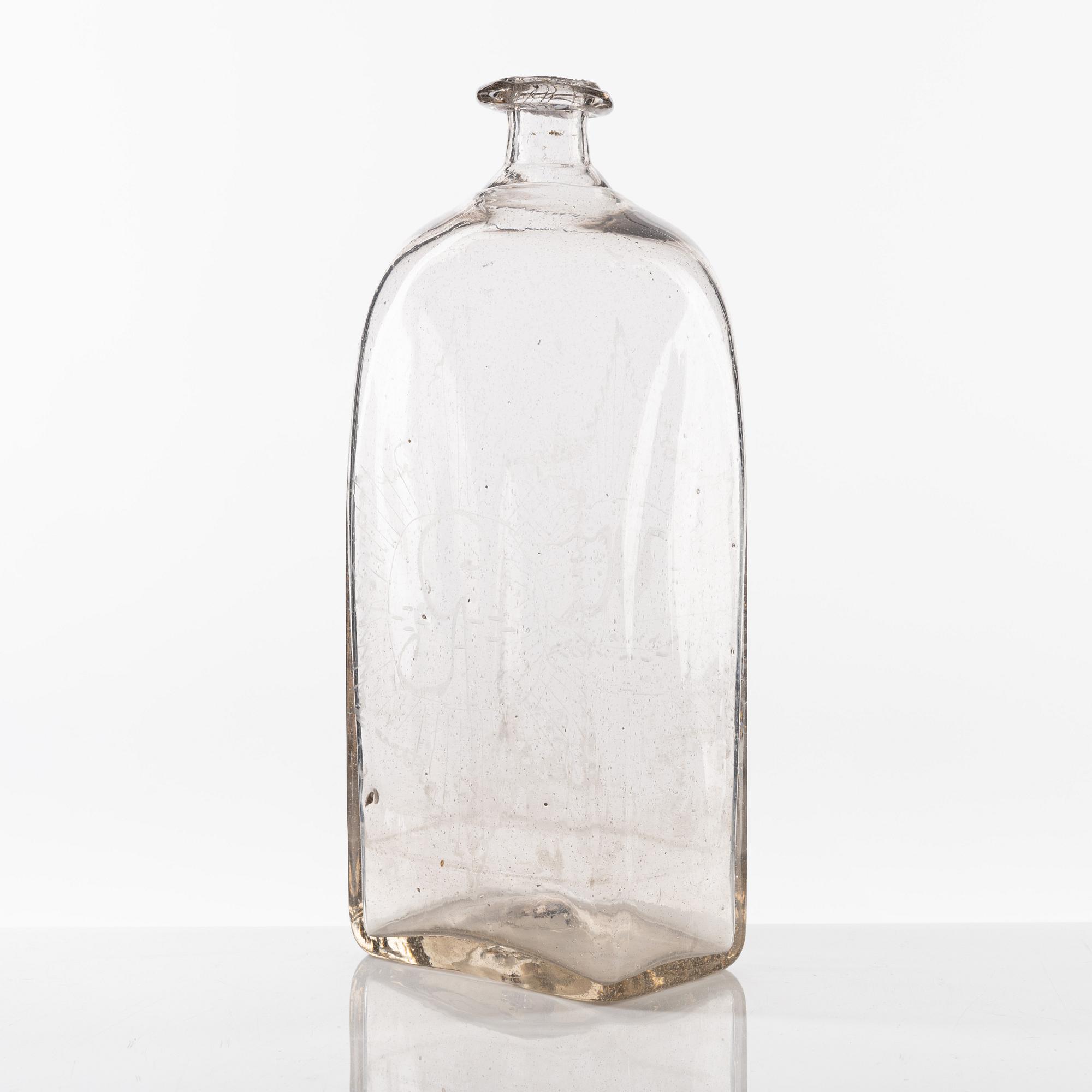A Swedish engraved glass bottle presumably from Limmared, circa 1800.