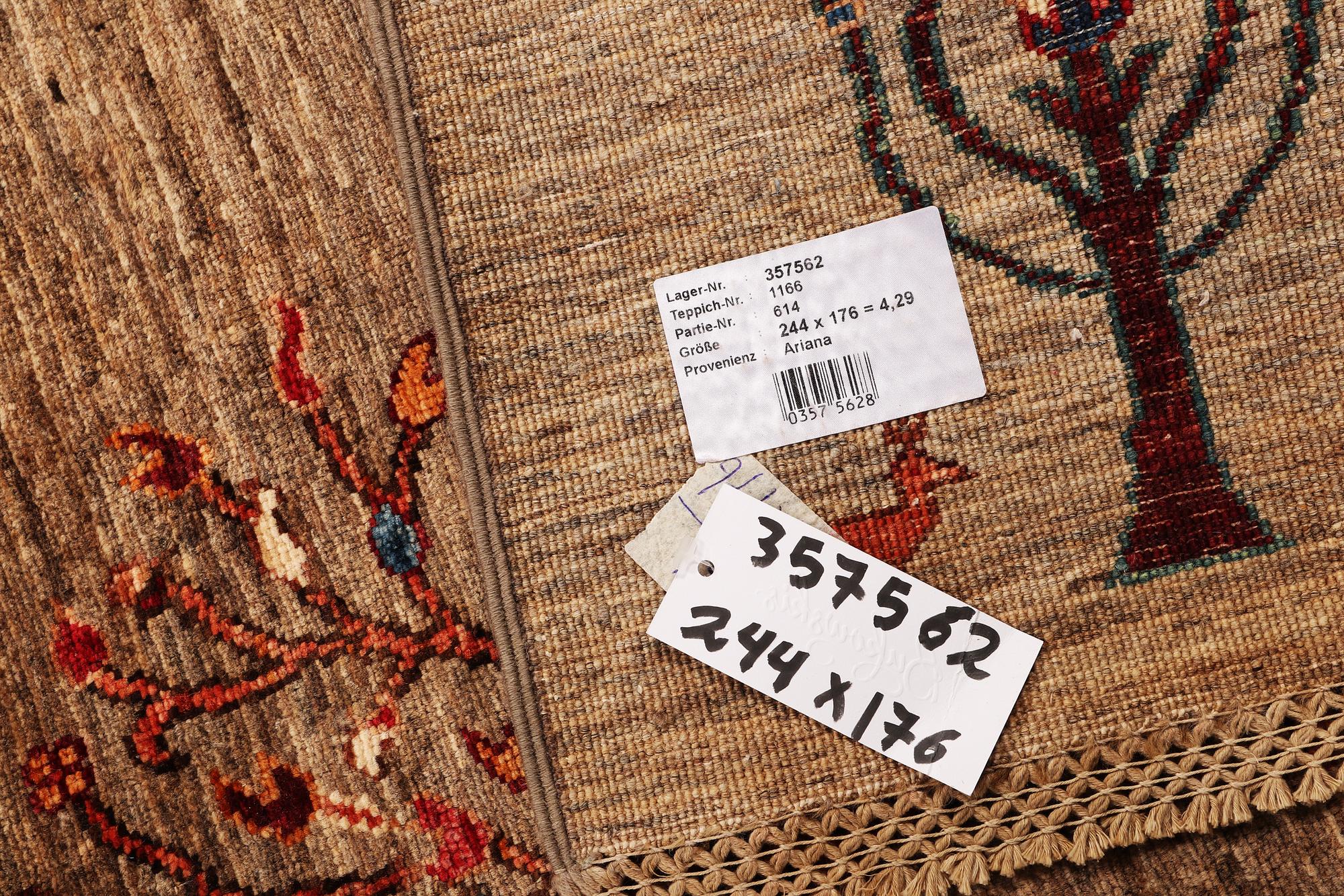 A Khorjin carpet, c. 244 x 176 cm.