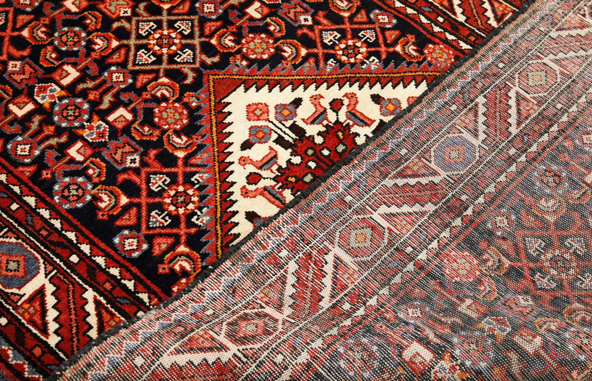 A Hamadan carpet, ca 325 x 115 cm.