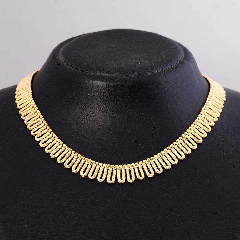 HALSSMYCKE, 18K guld. Uno a Erre, Italien.