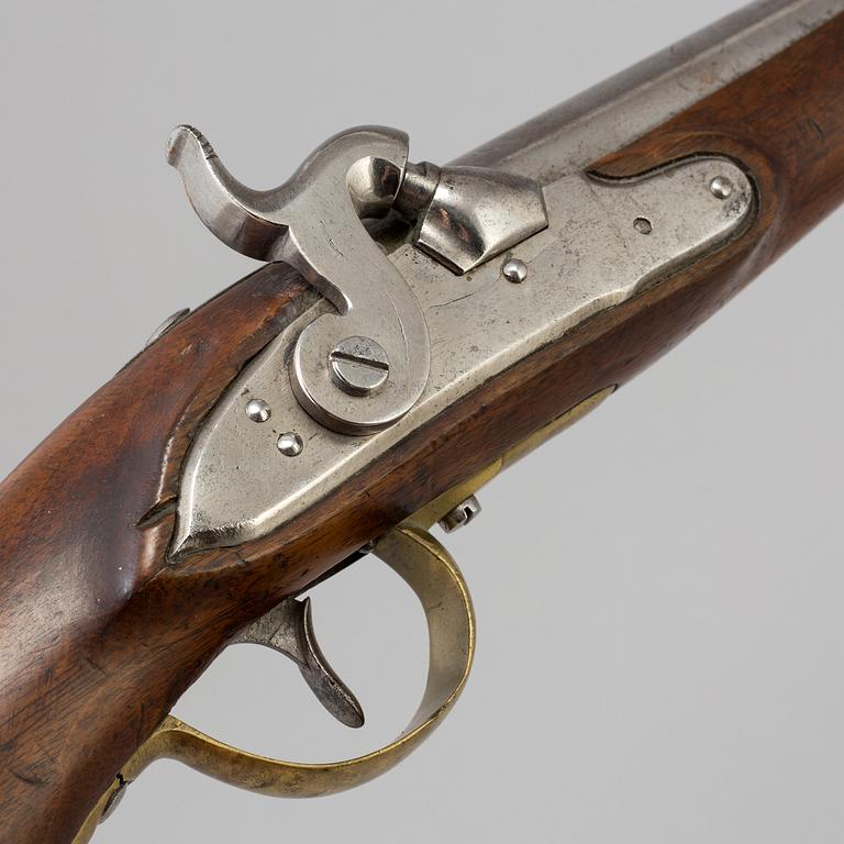 A first half of the 19th century percussion lock pistol.