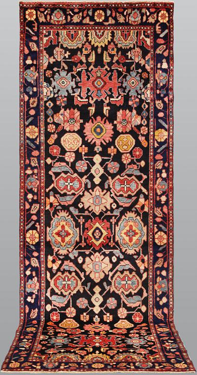 A semi-antique Bakhtiari runner, c. 287 x 95 cm.