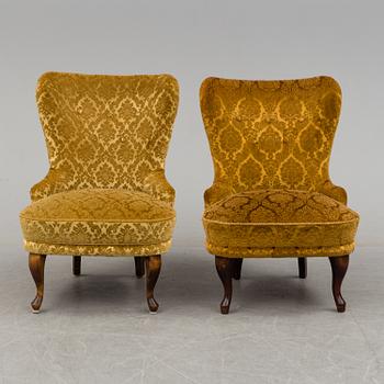 a pair of early 20th century chairs.