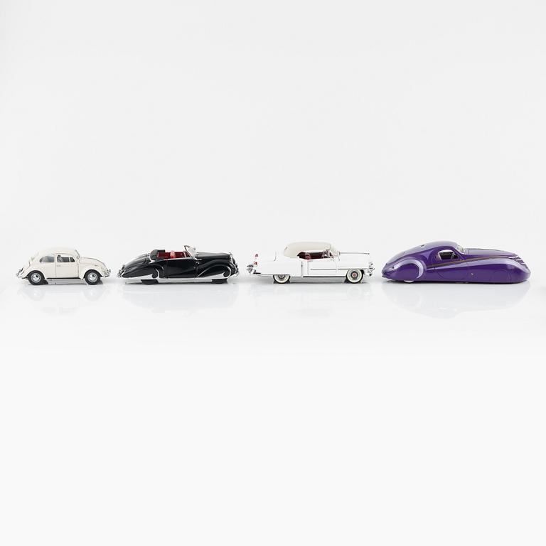 Four die cast model cars and four die cast model motor bikes, Franklin Mint.