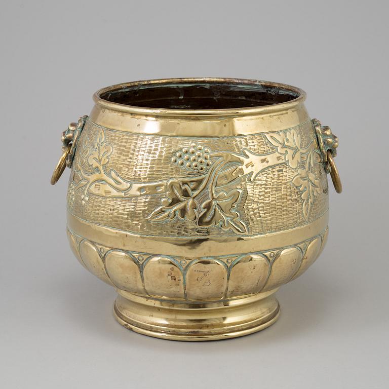 A 19th century brass flower pot.