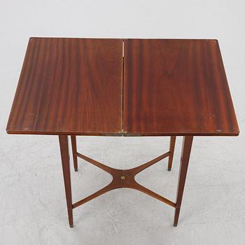 A late Gustavian style games table/sewing table, early 20th century.