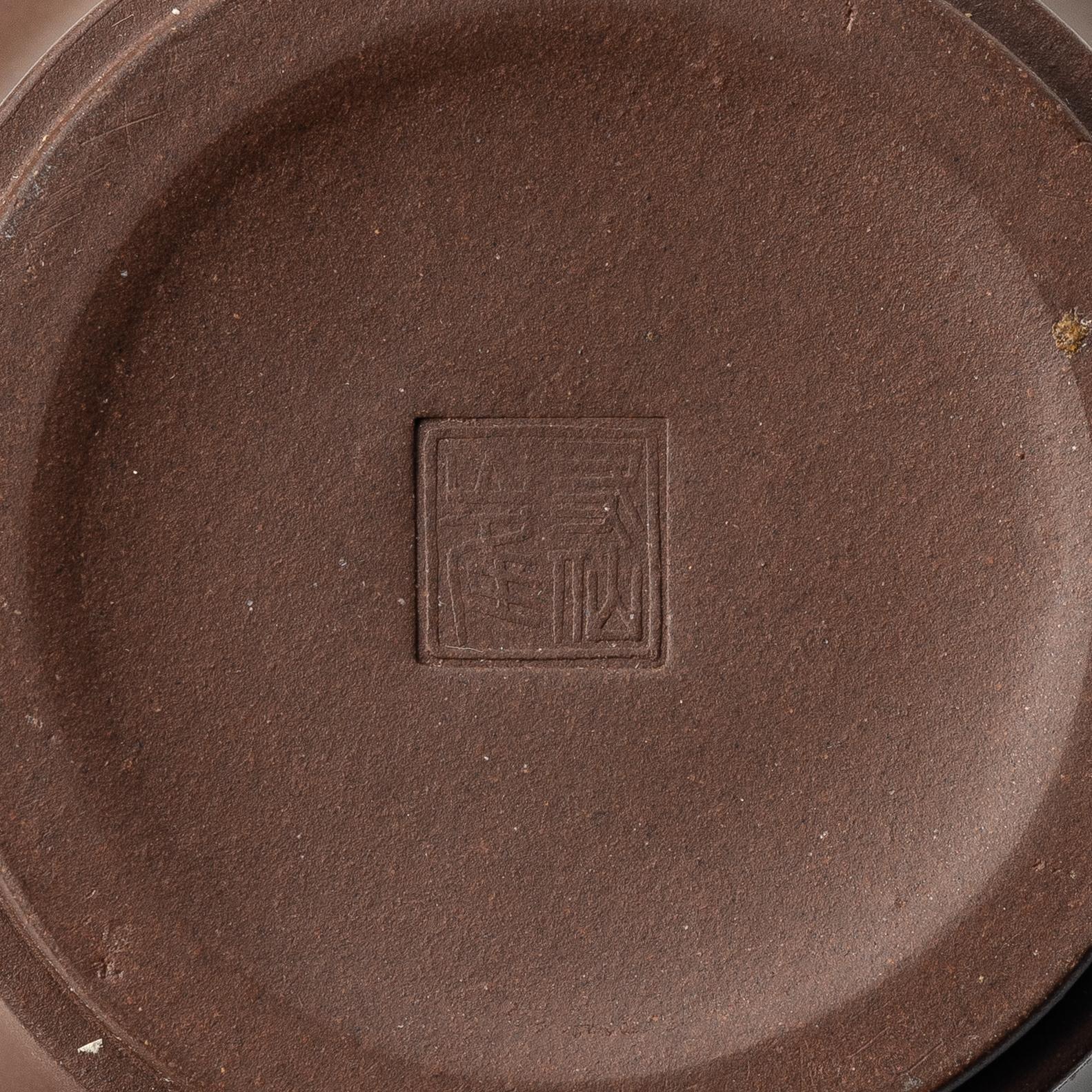 A group of Chinese yixing teapots, 1980s.