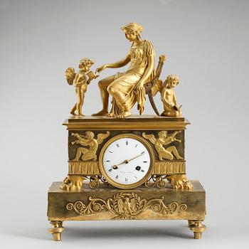 A French Empire early 19th century mantel clock, marked Thiery à Paris.