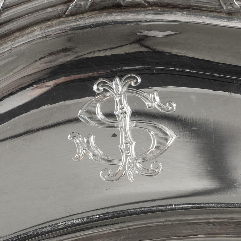 A set of seven silver plates (6+1), including GAB, Stockholm 1943.