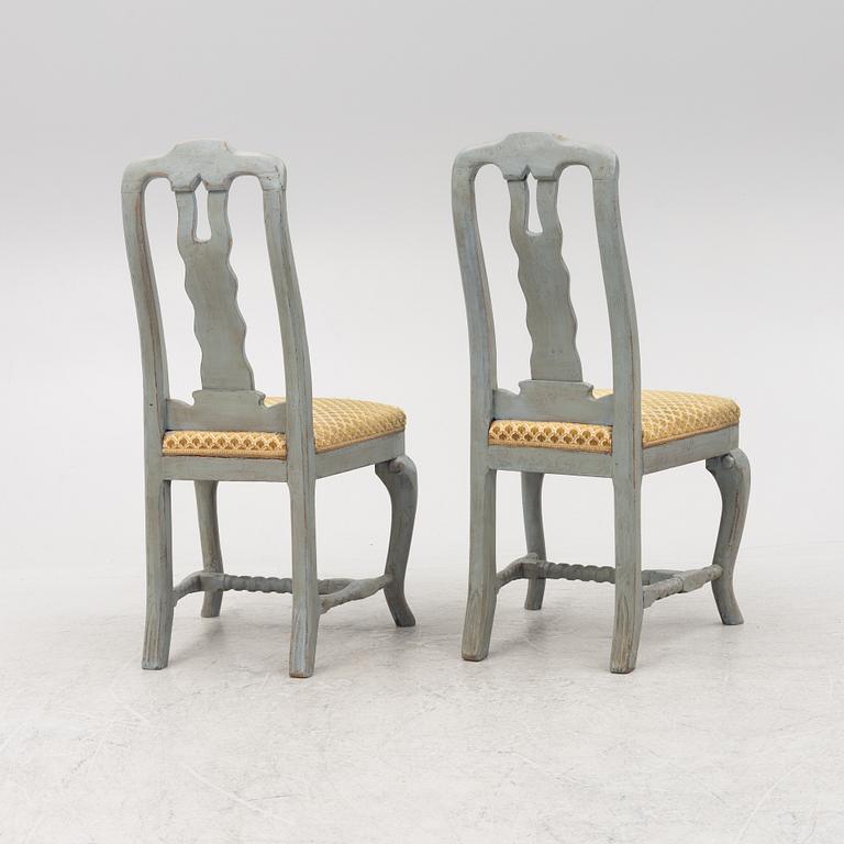 A pair of Baroque style chairs with older parts.