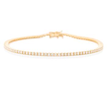 Tennis bracelet in 18K gold with round brilliant-cut diamonds.
