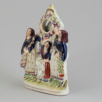 A fob watch stand, England late 19th century.