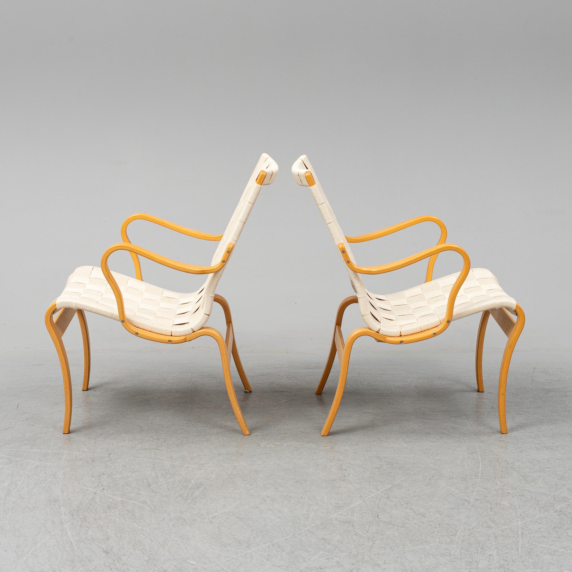 BRUNO MATHSSON, a pair of 'Mina' armchairs from Bruno Mathsson International, Värnamo, 1997.