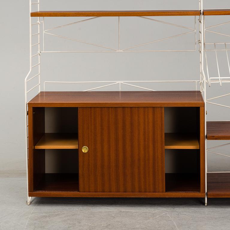 A 'String" bookcase, designed by  Nils Strinning,