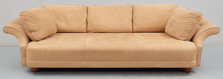 A Josef Frank 'Liljevalchs' sofa, Svenskt Tenn, reupholstered in light brown suede.