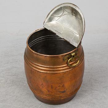 A 19th century copper water barrel.