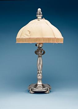 699. A Georg Jensen silver table lamp, Copenhagen 1919-21, 830/1000 silver.