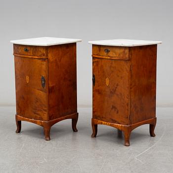 A pair of bedside tables, early 20th century.