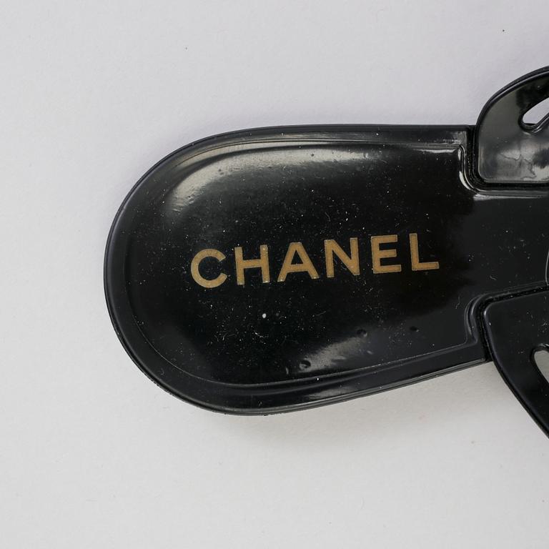 CHANEL, a pair of black plastic sandals. Size 38.