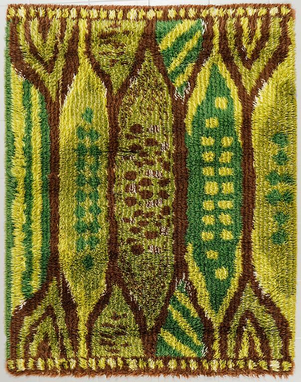 A machine made hooked rug, third quarter of the 20th century, 193 x 145 cm.