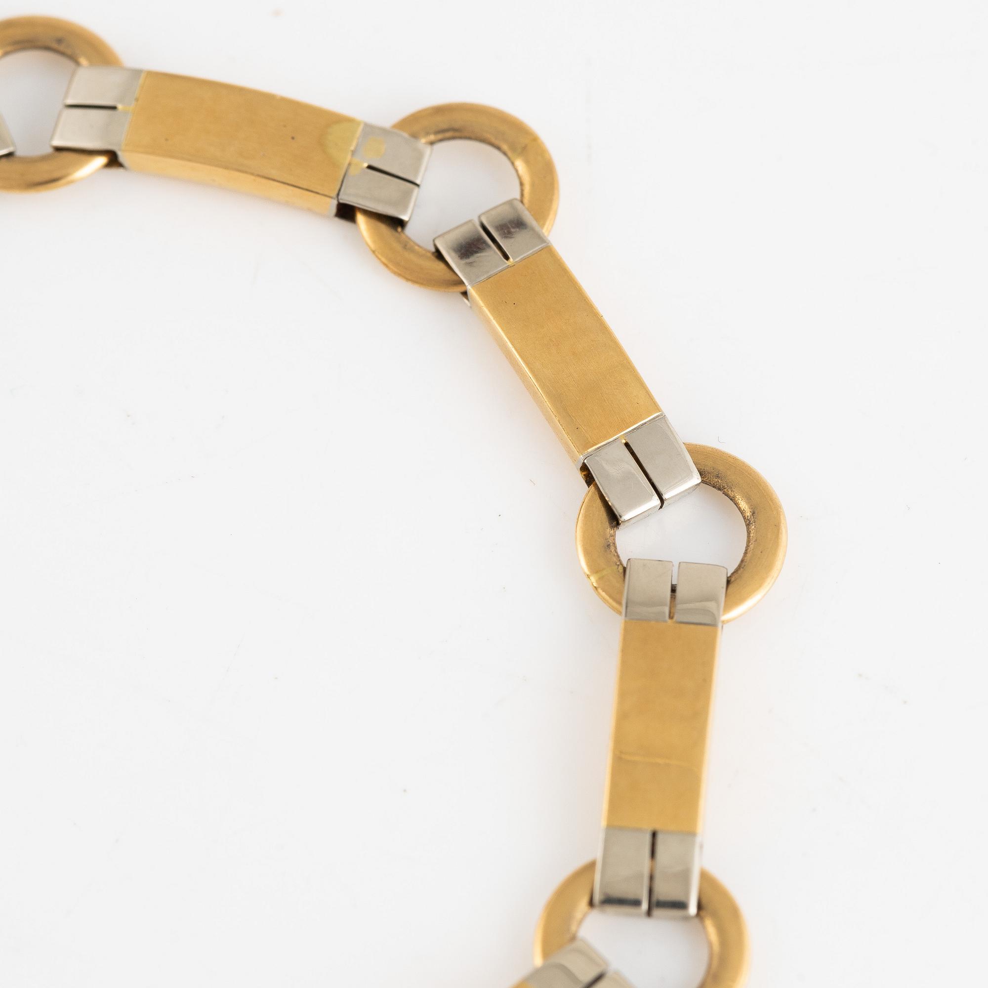 Armlänk, 18 k guld, svensk importstämpel.